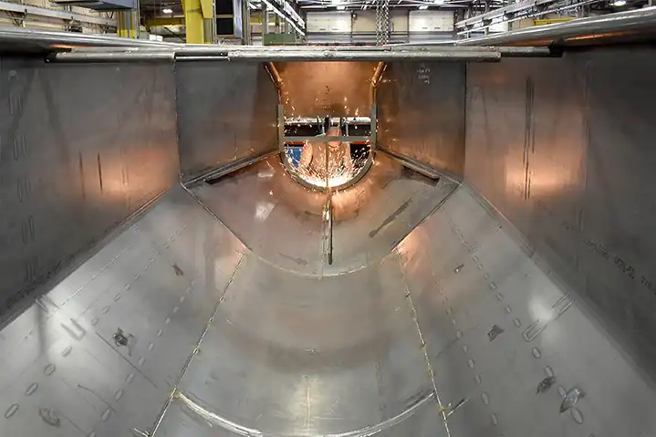 Concrete surge hoppers — 5,000 lb steel weldment, 50+ components, Milwaukee fabrication