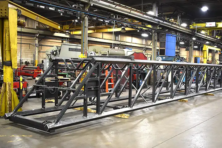 Telescopic conveyor system — 800 welded steel components, 30,000 lb, 150 ft extended