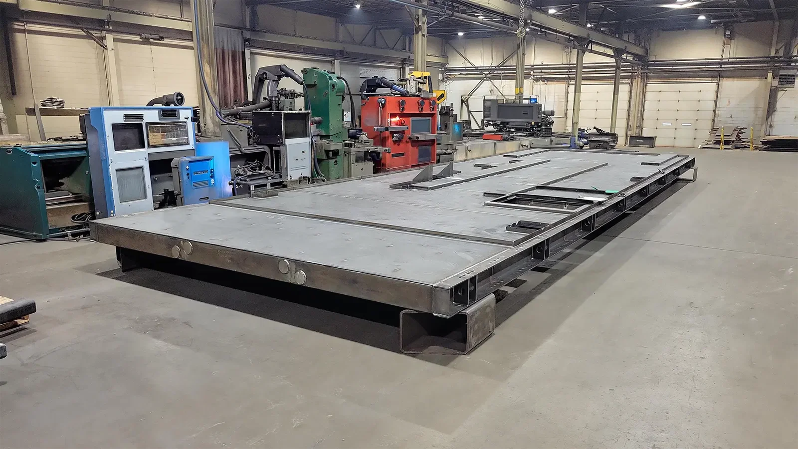 Power generation fabrication at Cutting Edge Fabrication — large welded steel subframe for power generation equipment on the Milwaukee shop floor